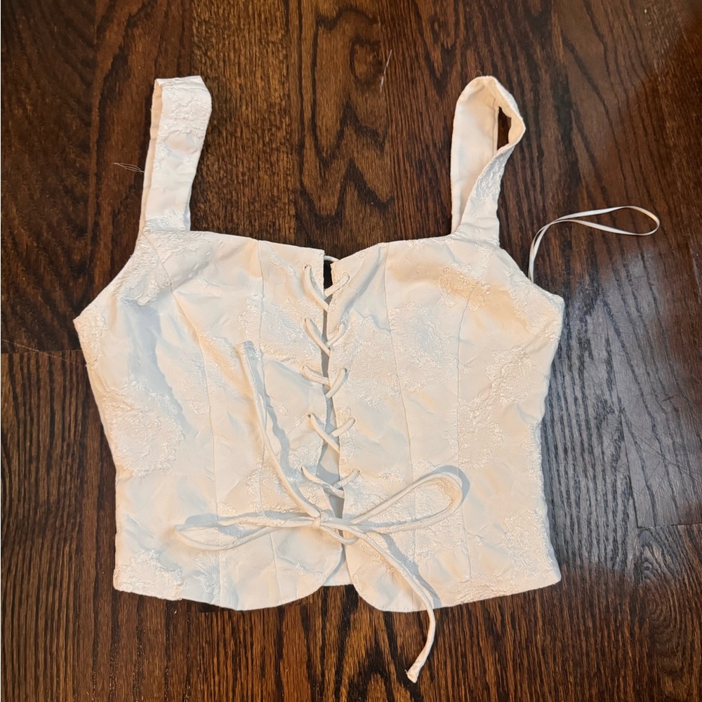 Front lace up tank, white flower embroidered, corset top, size small, brand NIA